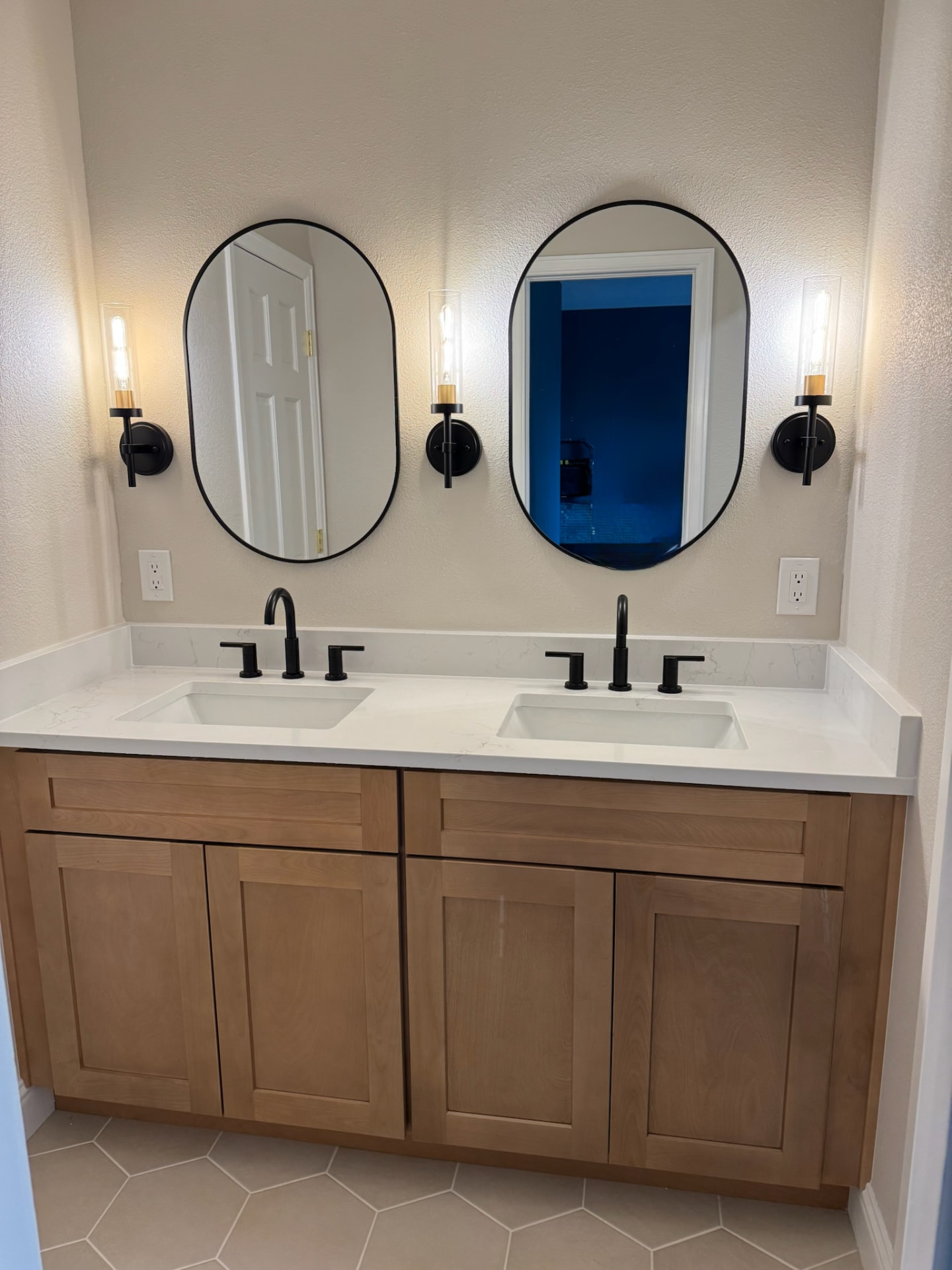 Finished double vanity with matte black fixtures